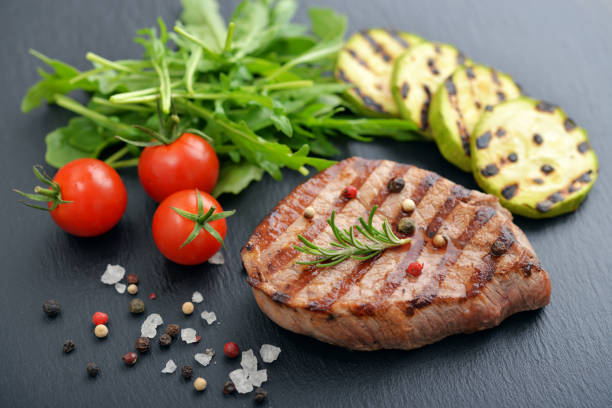 istock Grilled steak with rukkola 682435016