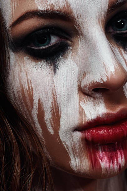 istock White painted Face of brunette Girl 682461532