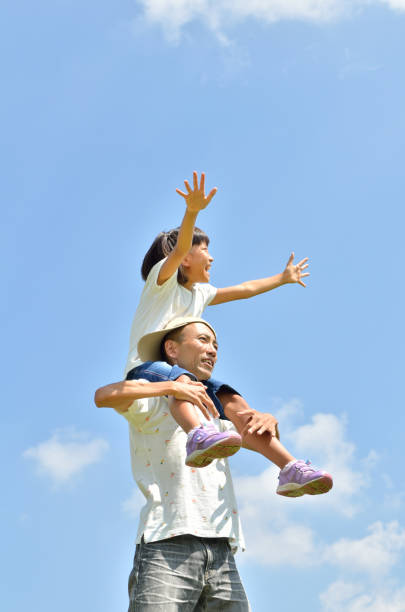 istock Parents and children in blue sky (summer) 682462154