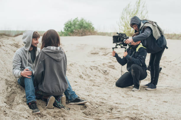 istock Behind the scene. Actor and actress in front of camera 682468508