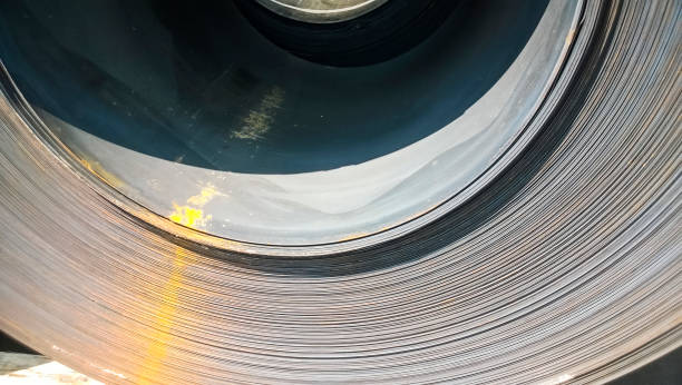 istock Steel sheets rolled up into rolls. Export Steel. Packing of stee 682469174