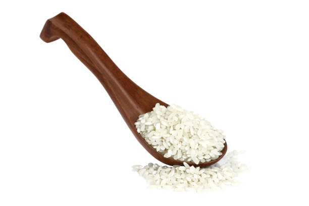 istock Milk rice in wooden spoon 682469200