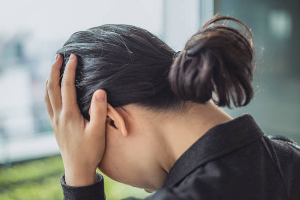 istock Businesswoman holding her head 682474774