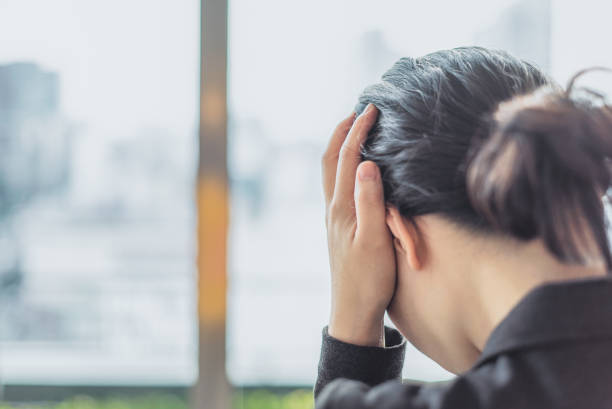 istock Businesswoman holding her head 682474816