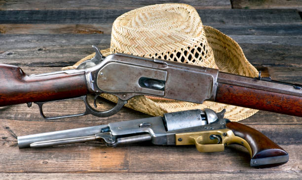 wild west guns. - cowboy hat wild west hat wood imagens e fotografias de stock
