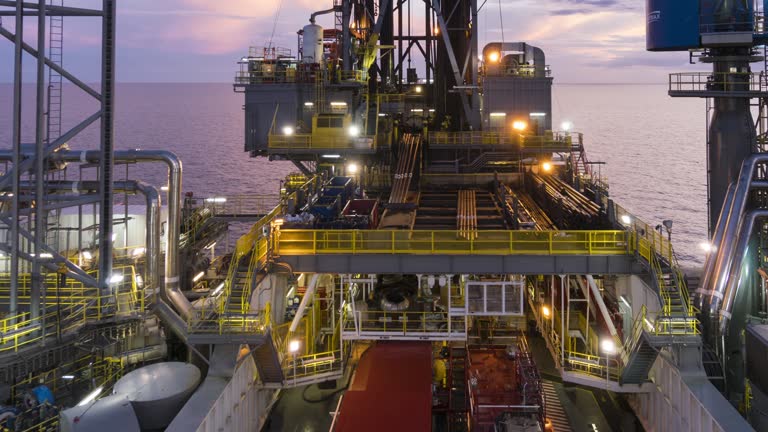 oil rig operation - night to day, time lapse