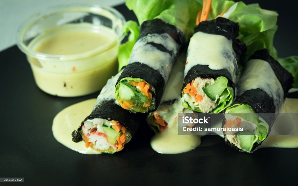 closeup Salad roll in black dish Salad roll in black dish tuna food Appetizer Stock Photo