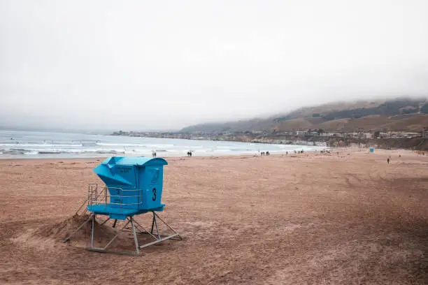 View of Pismo beach and lifeguard hut on a foggy day