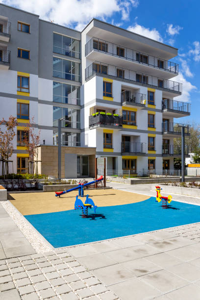 istock New modern apartment building with children's playground 682485458