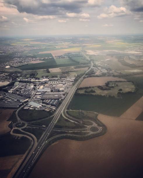 istock Aerial view on Paris and suburbs from airplane 682485526
