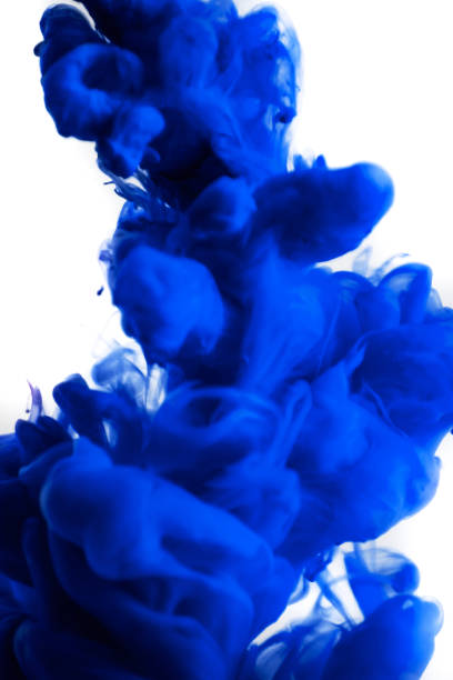 istock blue ink in water isolated on white background 682485670