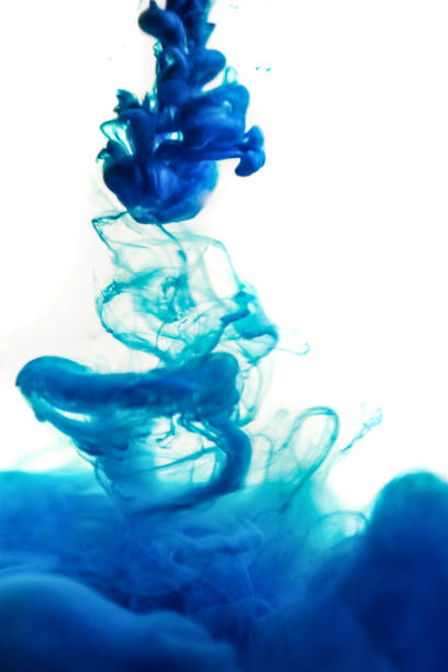istock blue ink in water isolated on white background 682485836