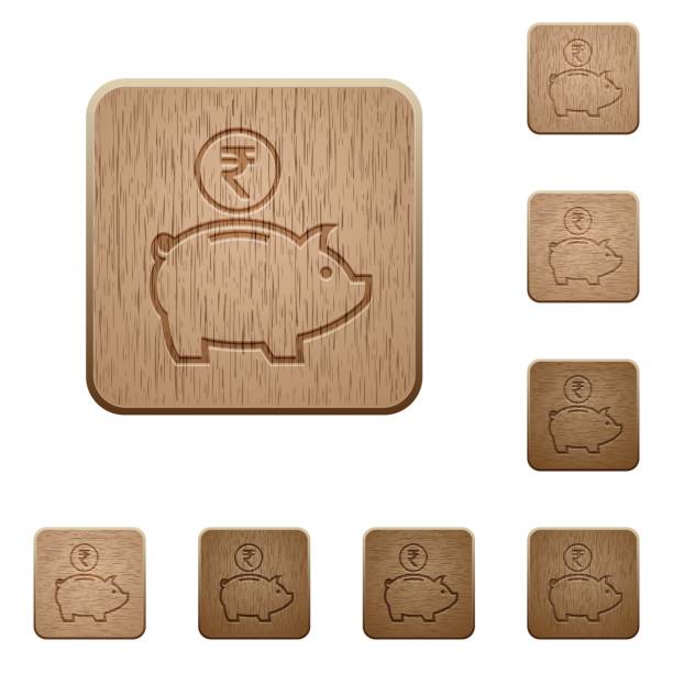istock Indian Rupee piggy bank wooden buttons 682486104