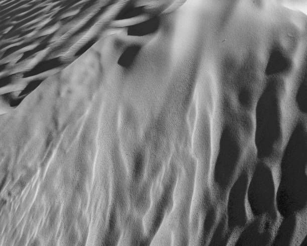 istock Black and White color (B&W). Natural texture and background of the desert. Sand patterns 682492684