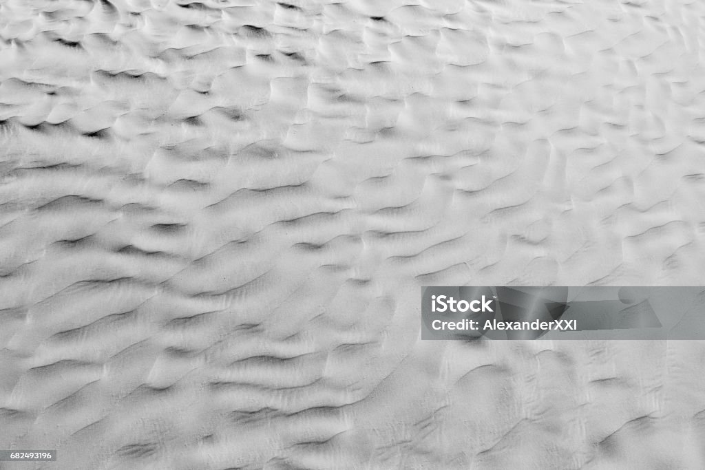 Zwart-wit kleur (B&W). Natuurlijke textuur en de achtergrond van de woestijn. Zand patronen - Royalty-free Achtergrond - Thema Stockfoto