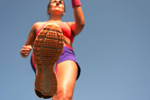 istock Young woman runner running,training for marathon 682497244