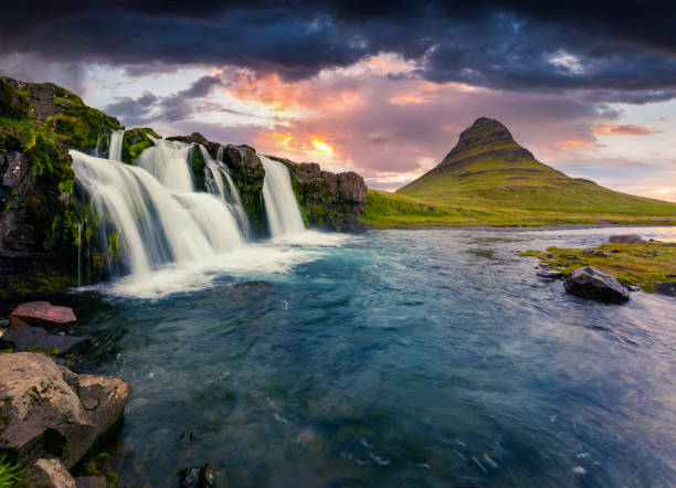 istock Summer sunset on famous Kirkjufellsfoss Waterfall 682500694