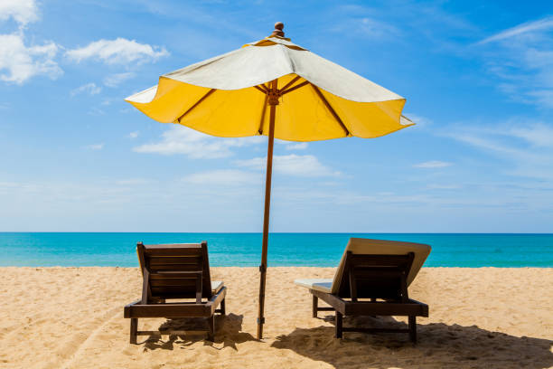 istock Chairs and umbrellas on a beautiful beach 682501614