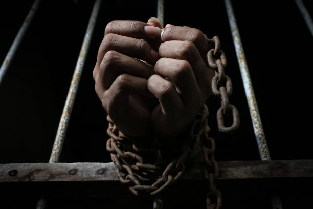istock Close up hand of the prisoner 682509570