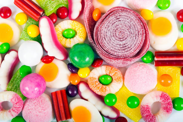 istock colorful candies and jellies background 682509944