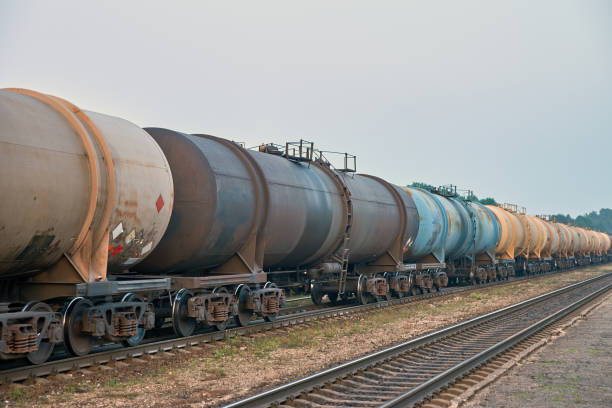 The train tanks with oil and fuel at early morning stock photo