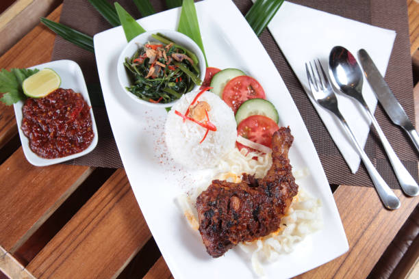 istock asian grilled chicken with delicious condiment sambal 682539906