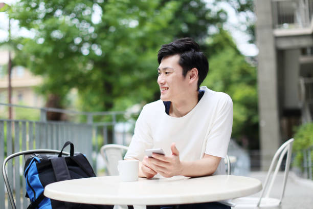 istock The university student who operates a smartphone 682543194