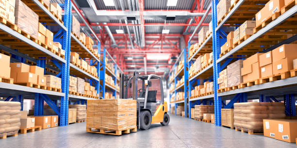 istock Concept of warehouse. The forklift between rows in the big warehouse. 3d illustration 682546800
