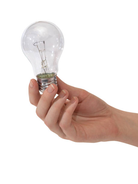 istock Lamp in female hand 682551110