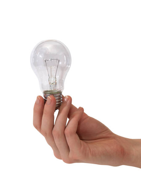 istock Lamp in female hand 682551112