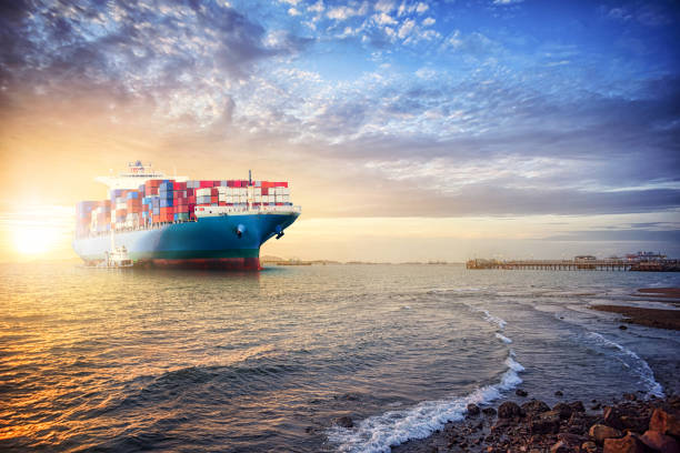 istock Logistics and transportation of Container Cargo ship in the ocean st sunset sky 682551278