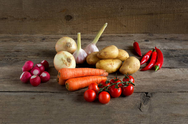 istock Vegetables on a wooden background 682554954