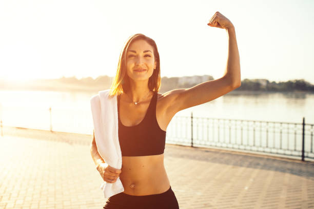 istock Jogger by the lake at sunset 682559050