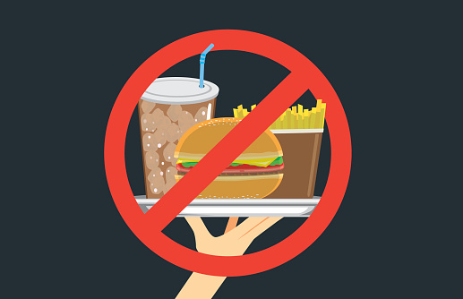 Hand holding fast food in silver dish with stop signal. Illustration about eating with wrong .