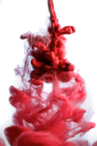 istock red ink in water isolated on white background 682564024
