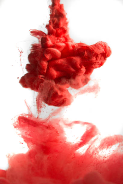 istock red ink in water isolated on white background 682564300