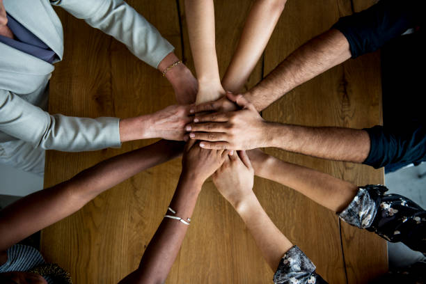 human hands together holding together - 3109 imagens e fotografias de stock