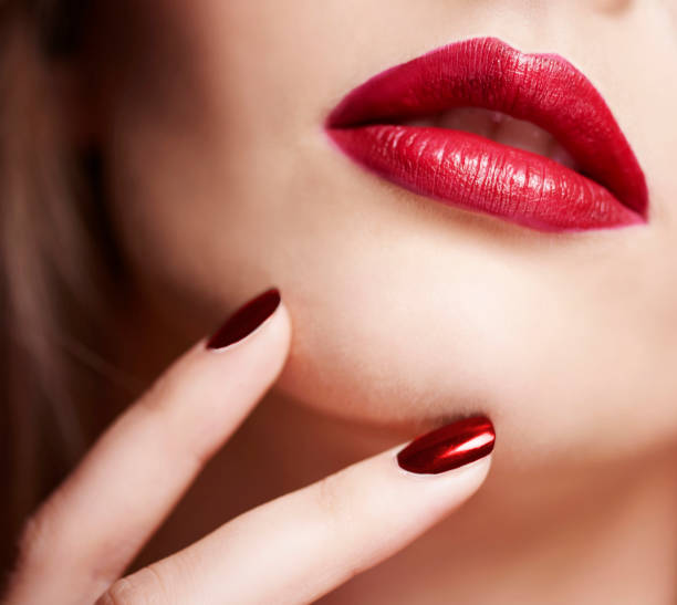 istock Close up on red female face 682571198