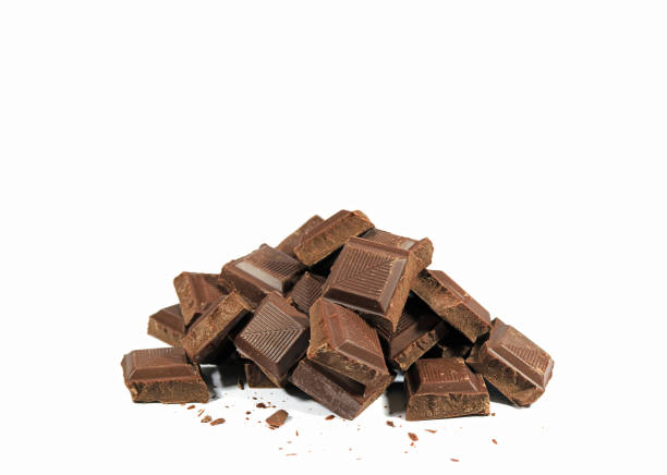 istock Pile of Dark Chocolate Chunks Isolated on White Background 682571968
