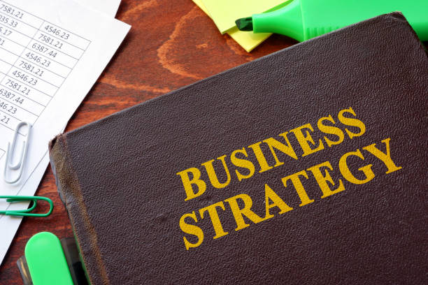 istock Book with title business strategy and financial data. 682578086