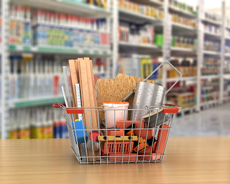 construction tools and materials inside  a shopping basket. 3d illustration