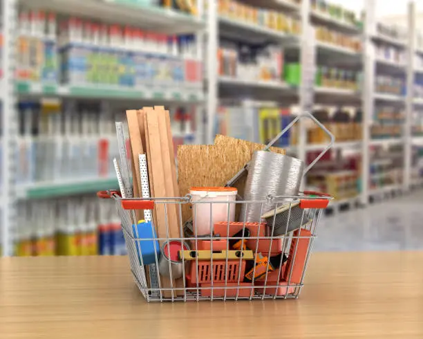 Photo of construction tools and materials inside  a shopping basket. 3d illustration