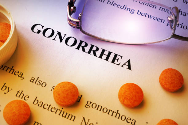 istock Page  with title Gonorrhea and pills. 682578426