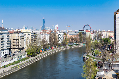 The cityscape around the Danube Canal looking toward Praterstern with the UNO city in the background.