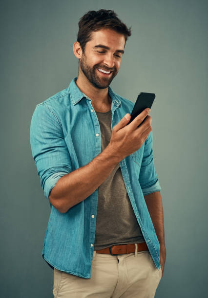 istock Downloading some must-have apps to his phone 682621378
