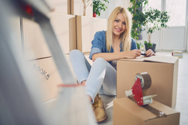 istock Girl in new apartment 682622640