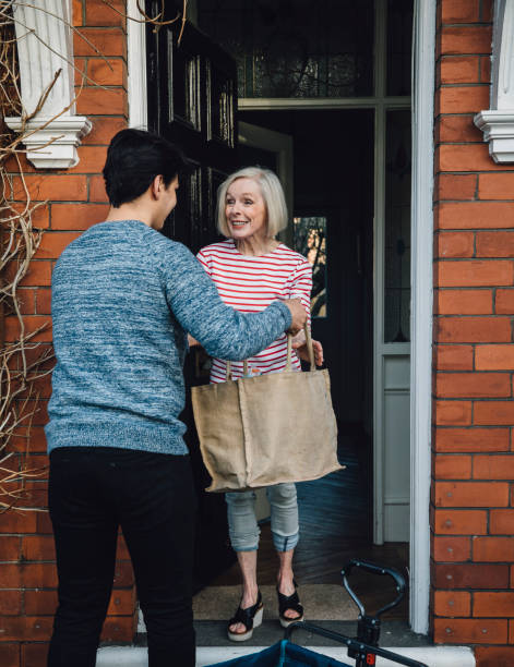 istock Delivering Groceries To The Elderly 682632942