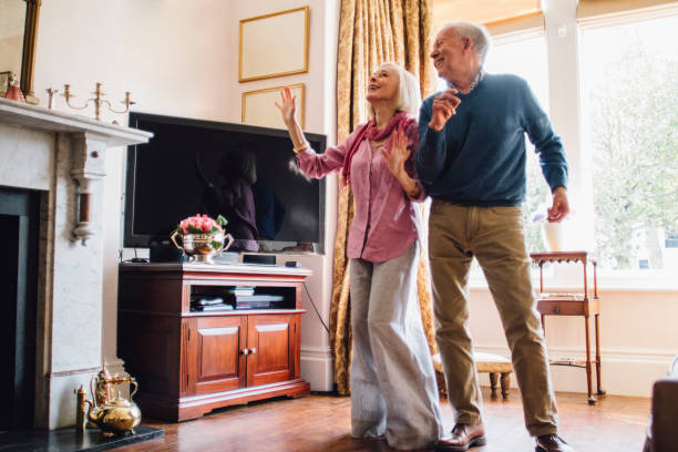 istock Seniors Dancing At Home 682635078