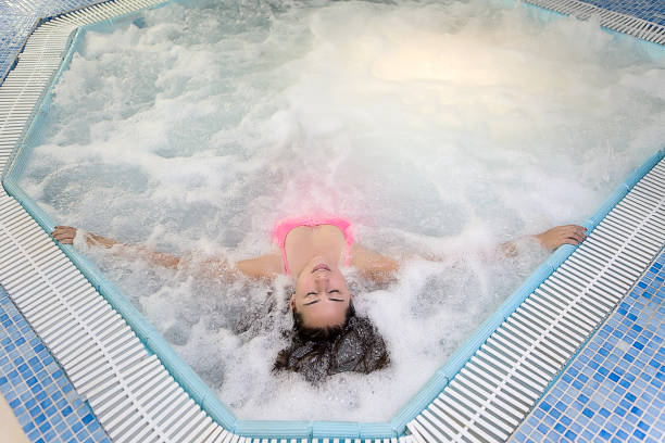 istock Woman resting in bubble pool 682636692