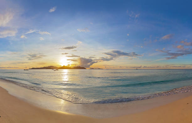 istock Sunset on tropical beach - Seychelles 682636976